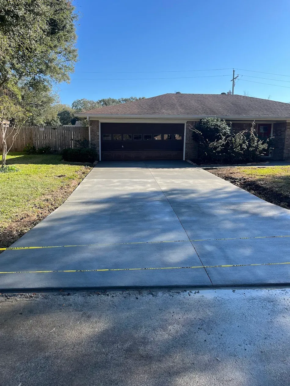 New broom-finished concrete driveway in Beaumont TX